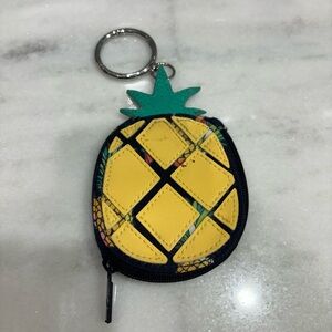 Vera Bradley Pineapple bag charm in the Toucan Party pattern with stitched leath